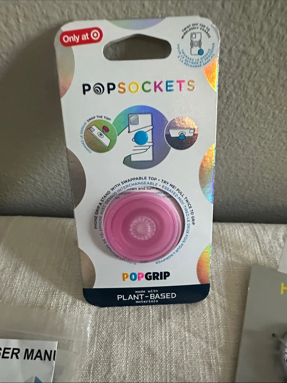 Pink PopSockets for phone, keychain & holder for air tags, a black tracking fob